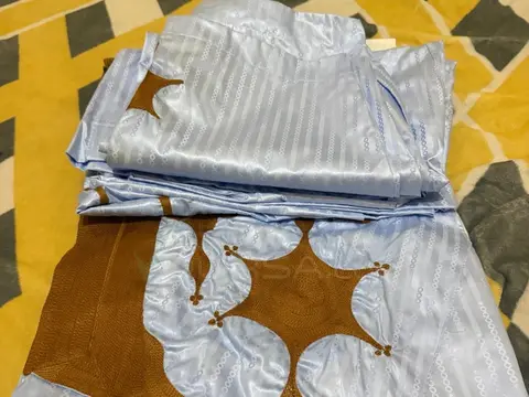 دراعة وسروال من گزنير ملبوسة ليلة وحدة